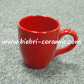 red ceramic coffee and tea mugs and cups